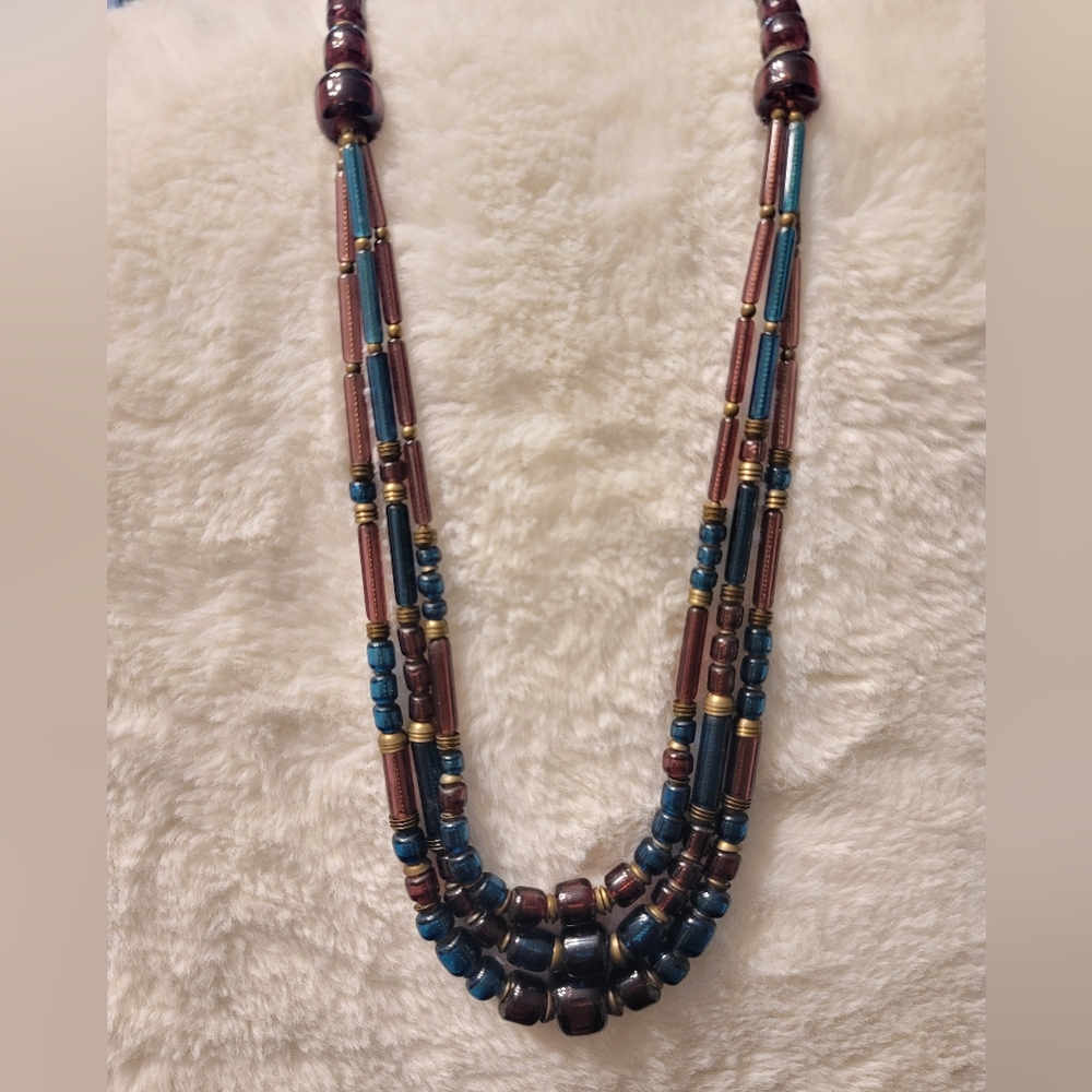All Glass Very Vintage Aegean Blue & Wine Colored Necklace With Brass Elements.